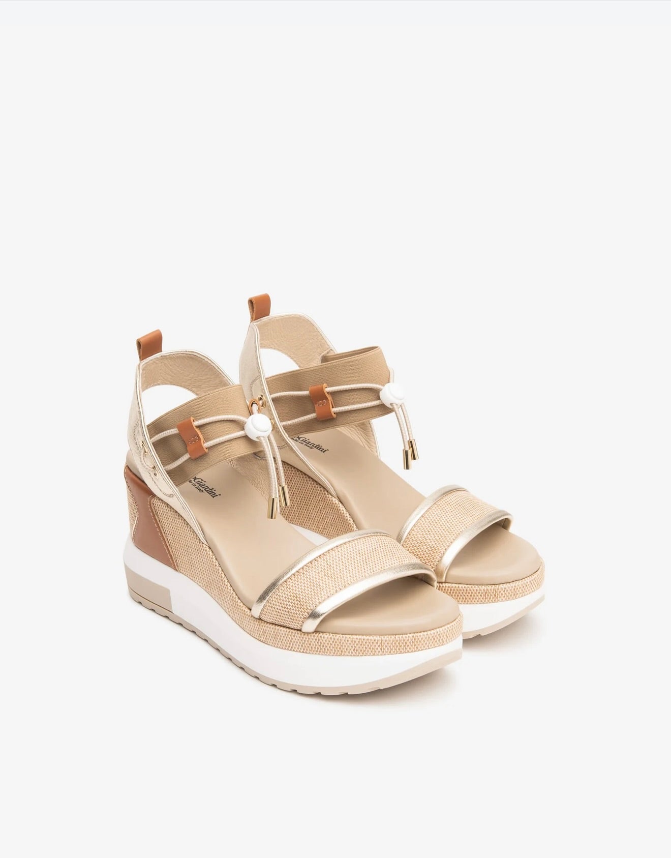 NeroGiardini Bungee Platform Wedge Sandals in Gold by Sierra Deene