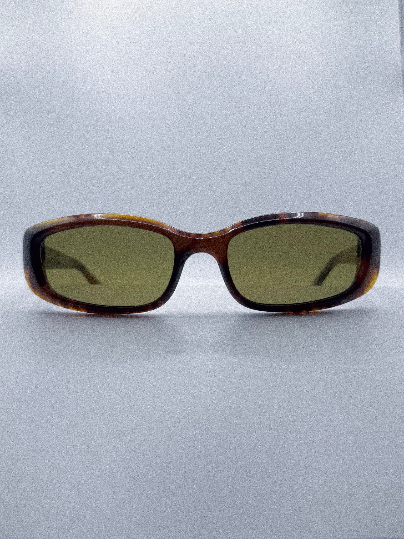Olive Theory | 1990s Donna Karan Sunglasses by AZYR Specs
