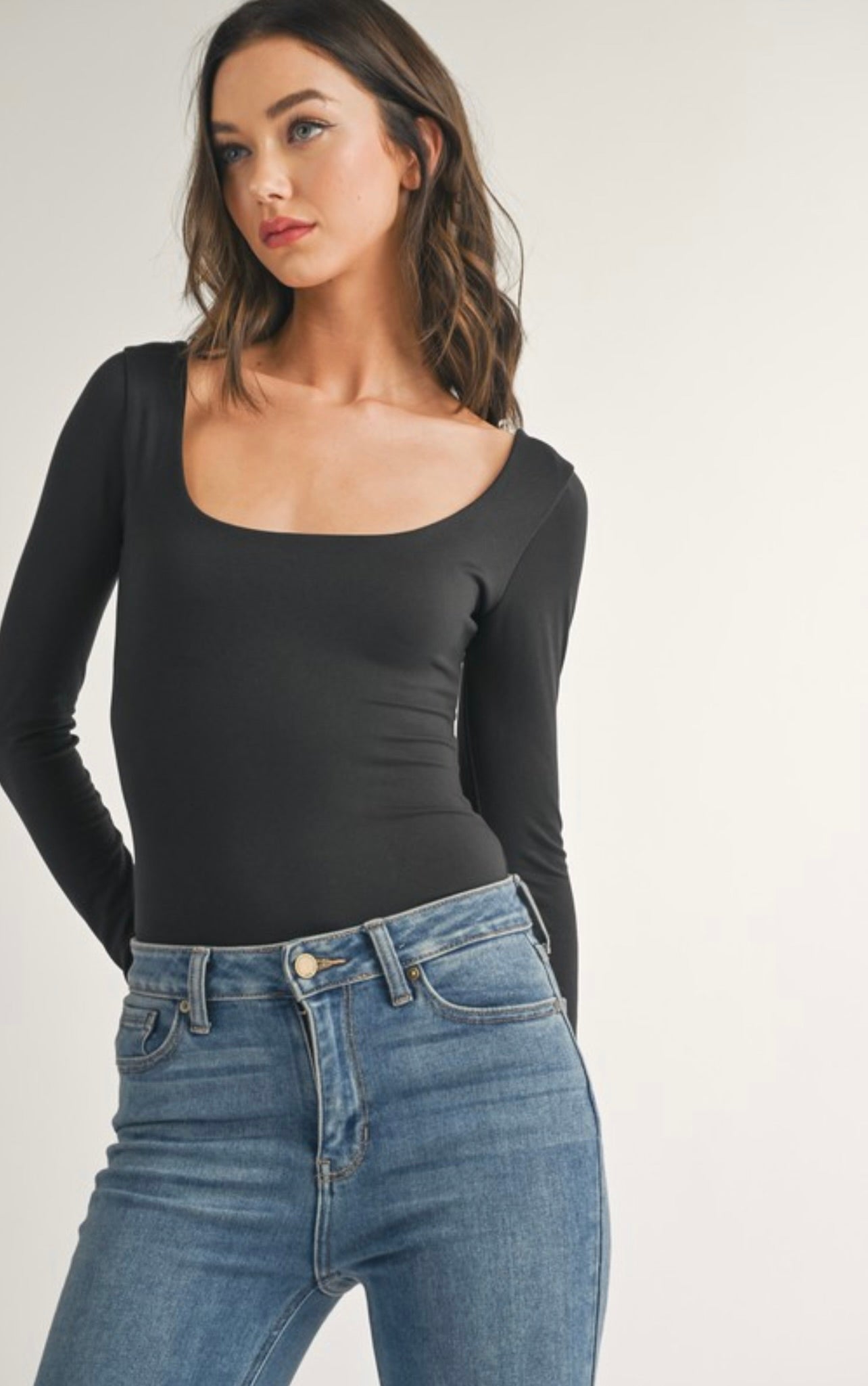 Self Double Scoop Neck Long Sleeve Bodysuit in Black by Sierra Deene