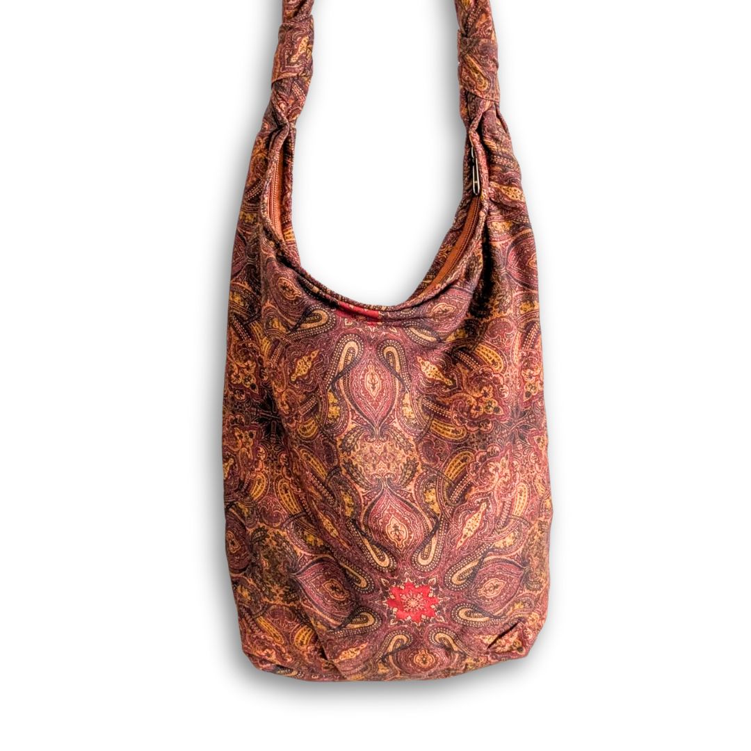 Vibrant crossbody sling handbag with knotted strap by Shakti.ism