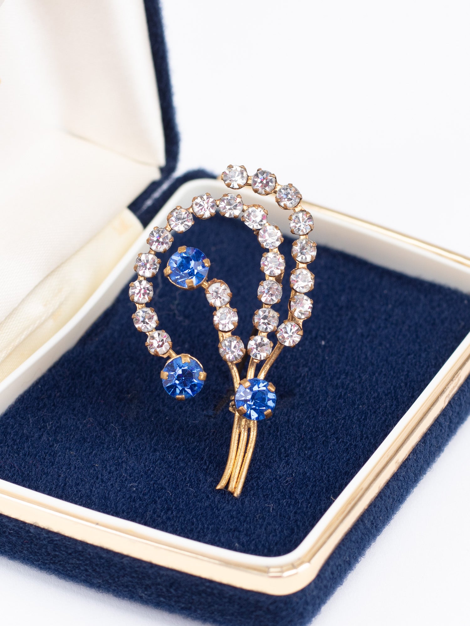 Vintage 50s Sparkling Floral Brooch with Blue and Clear Rhinestones by Northern Grip