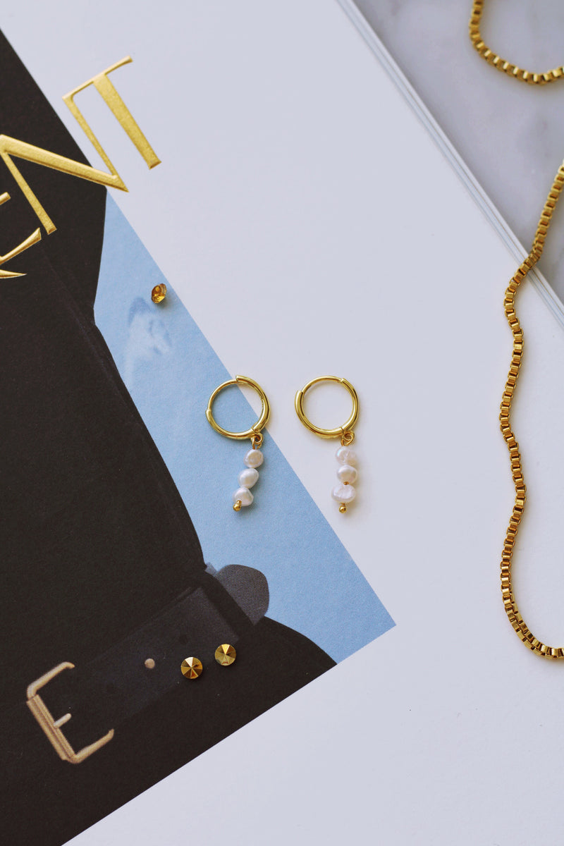 ELIZA GOLD & PEARL HUGGIE EARRINGS by RAËLIV
