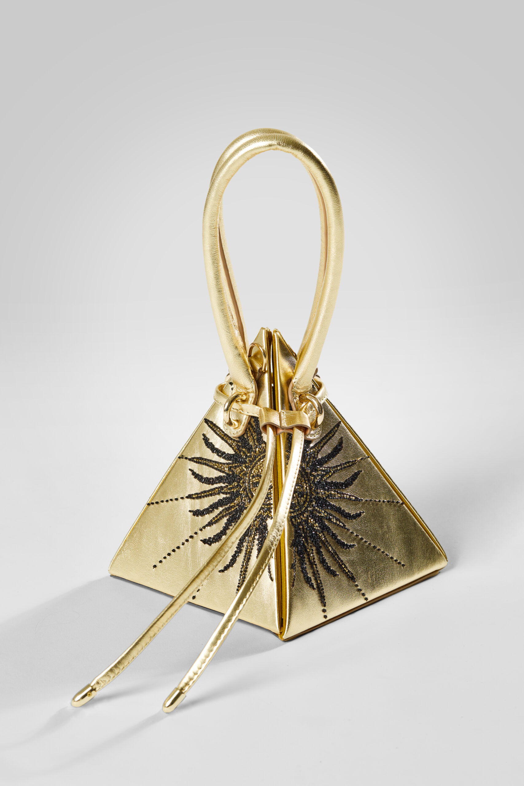 The Siren of the Sun pyramid bag by Songs of Siren